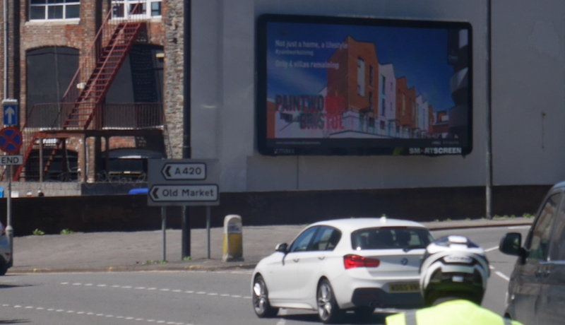 digital billboard on busy roundabout junction